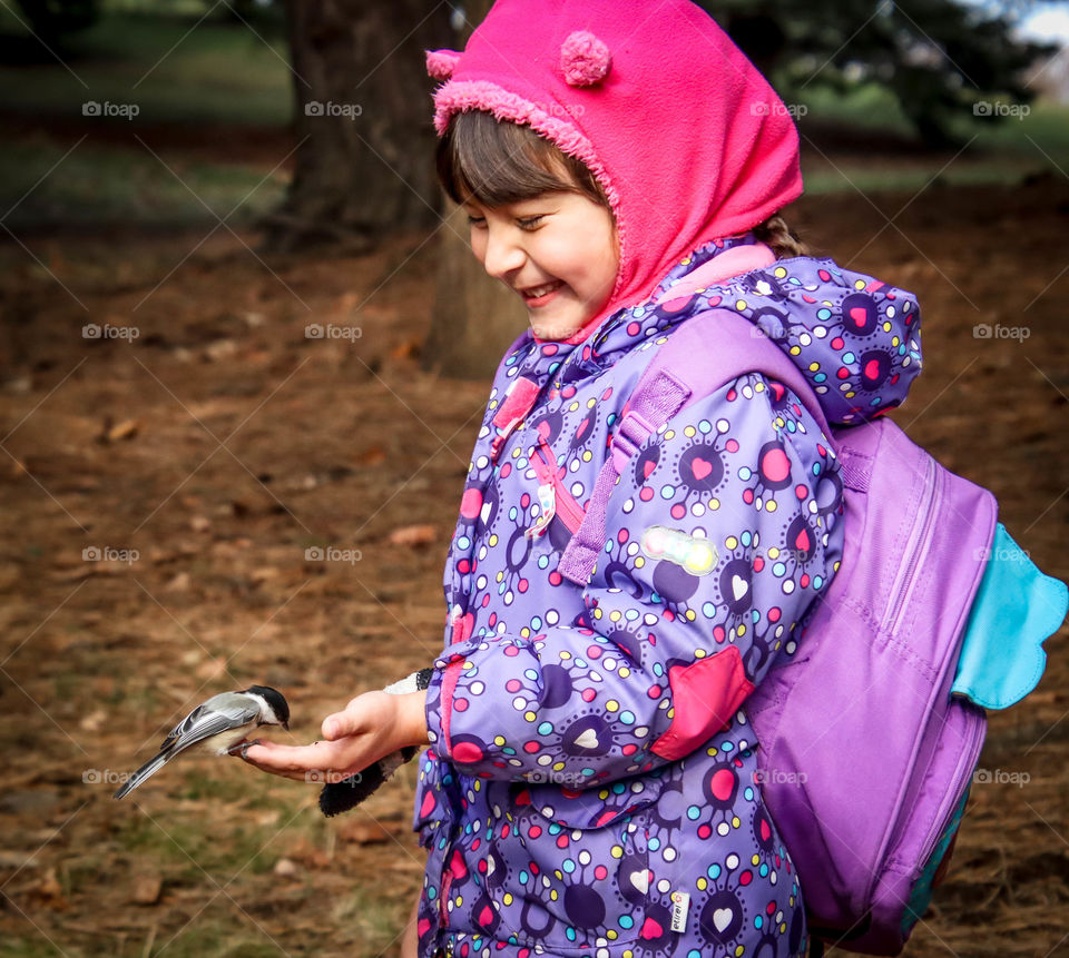 Cute little girl is feeling chikadee