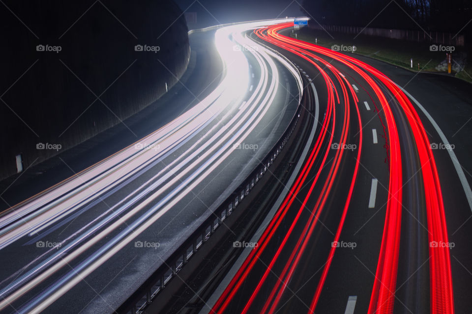 Car light trails on highway