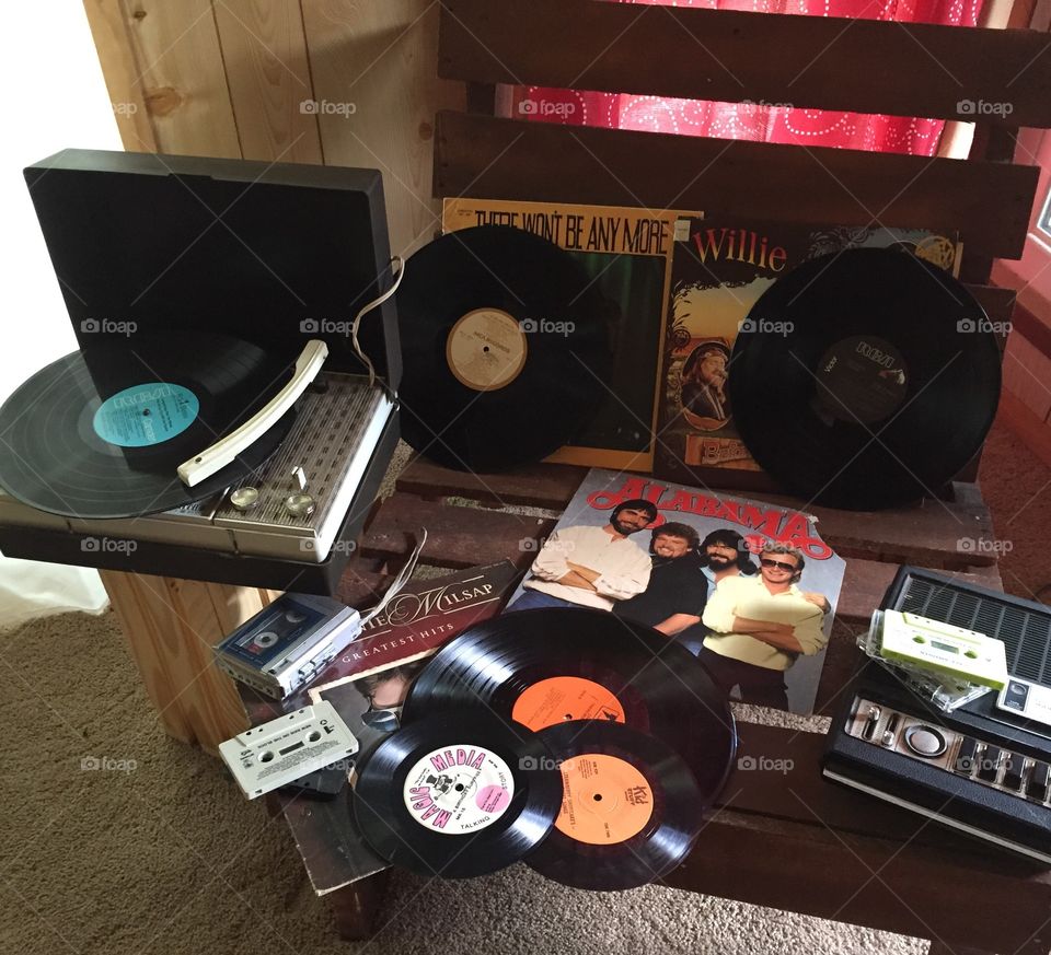 Playing my vinyls and cassettes on my old machines spells Happy!