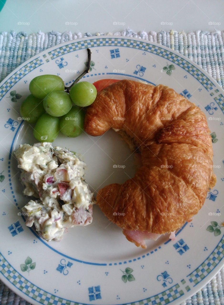 Croissant and grapes