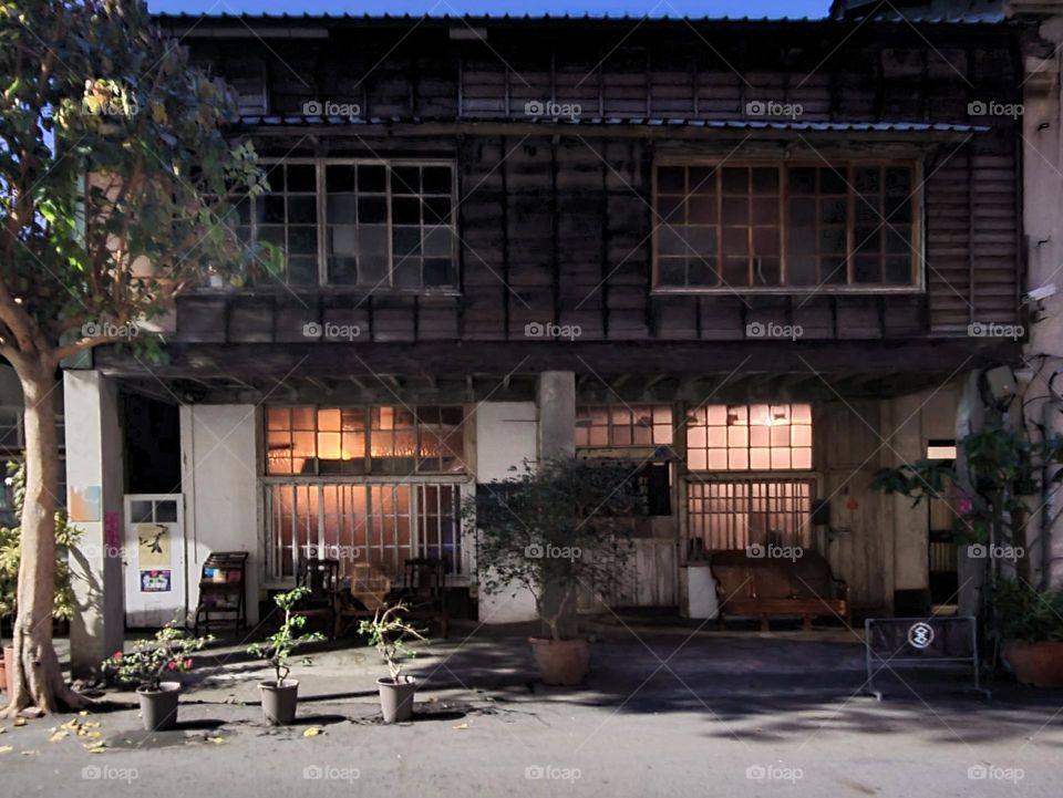 Century-old wooden building, established here in 1909 佐佐木商店高雄支店
Traditional rain panel building.