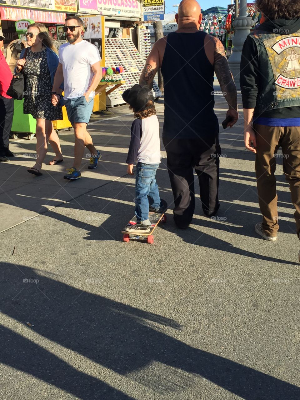 Super cute little skate boarder