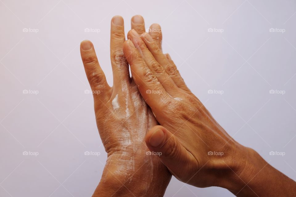 Woman puts hand cream every day