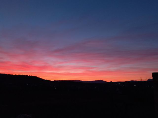fiery red clouds during sunrise.