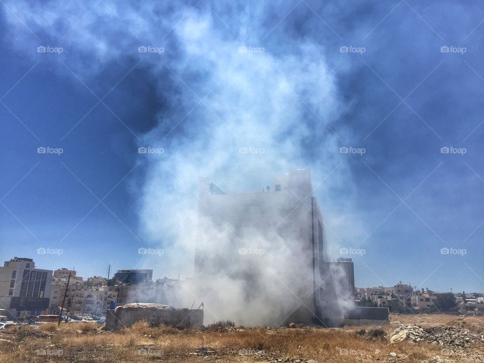 Garbage fire. How a lot of garbage is being disposed of in Amman, burnt dangerously close to building, let alone the environment