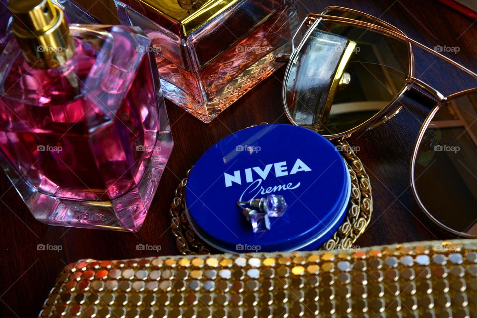 Nivea cream and sunglasses female, summer vacation