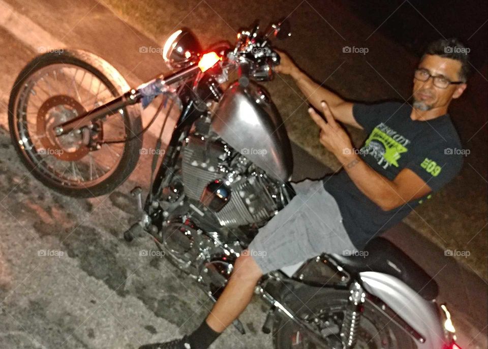 cool biker on Harley Davidson
