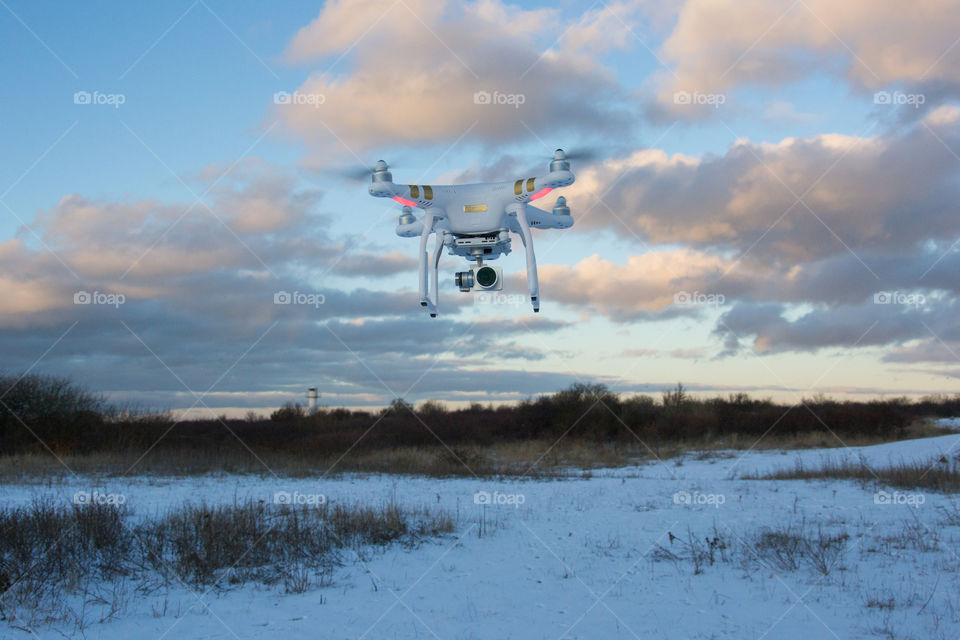 Phantom drone in the air taking pictures.