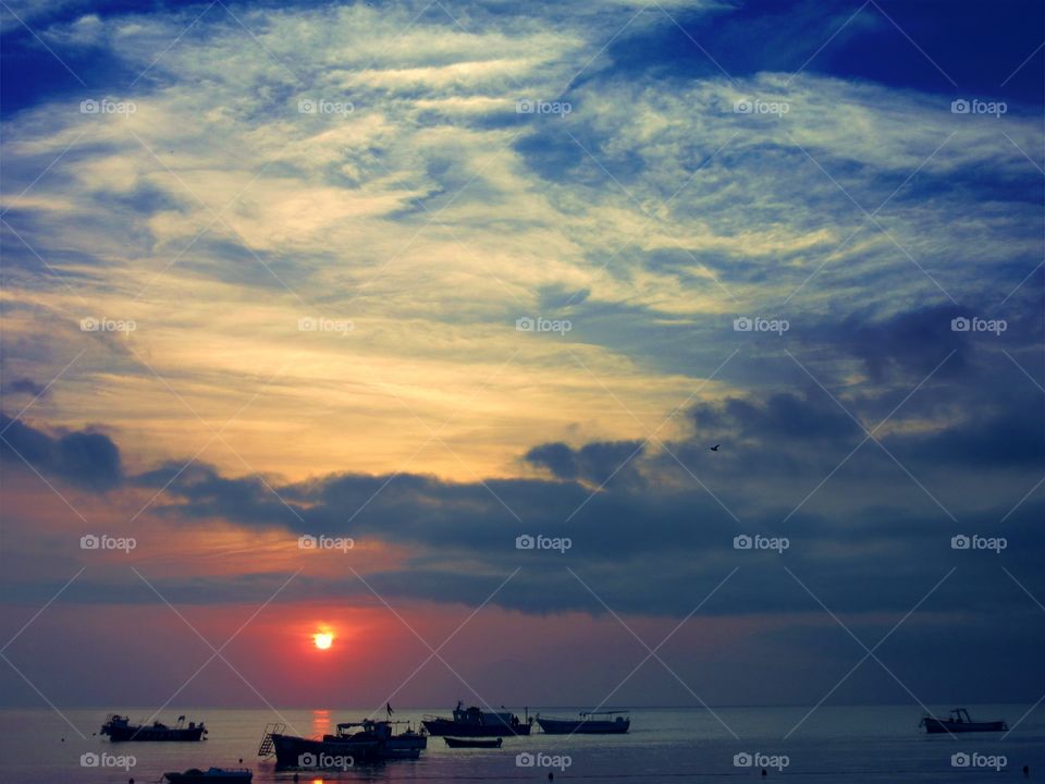 Whethering during Sunset  (Praia -  Italy ).