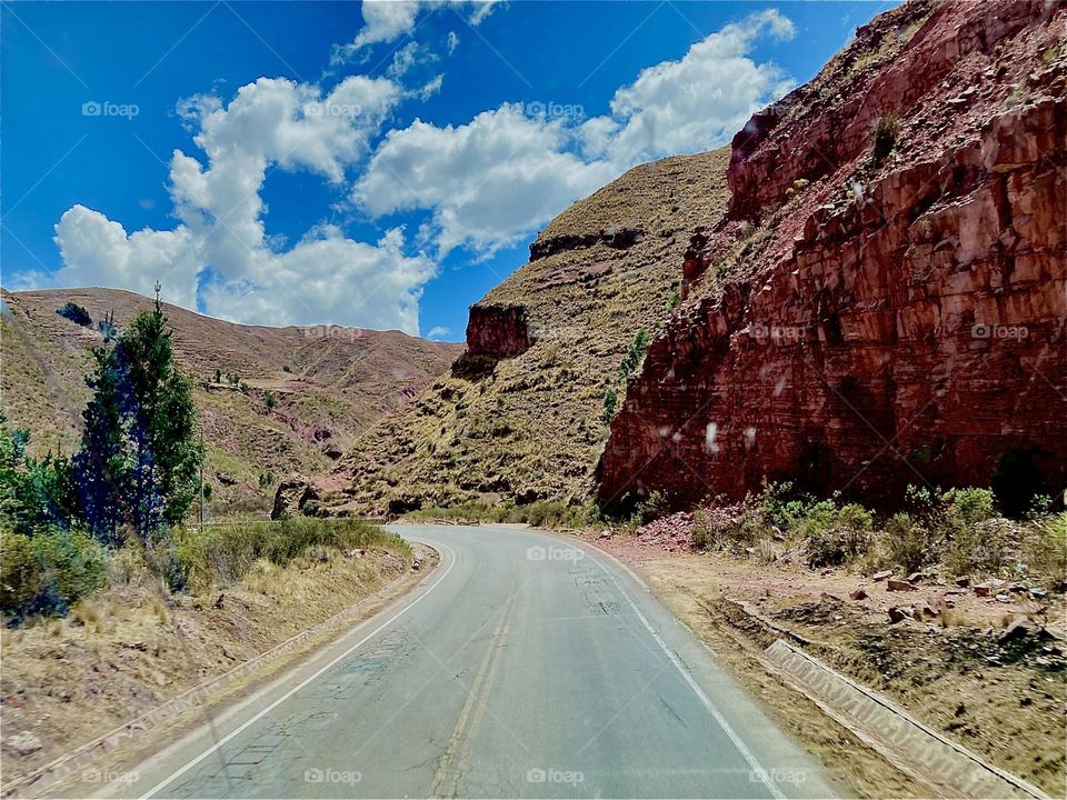 This mountain road brings locals as well as tourists alike to the shores of the “Uniyuni Salt Lake” in “Bolivia” in “Central America”. 2022. Hypnotic Productions
