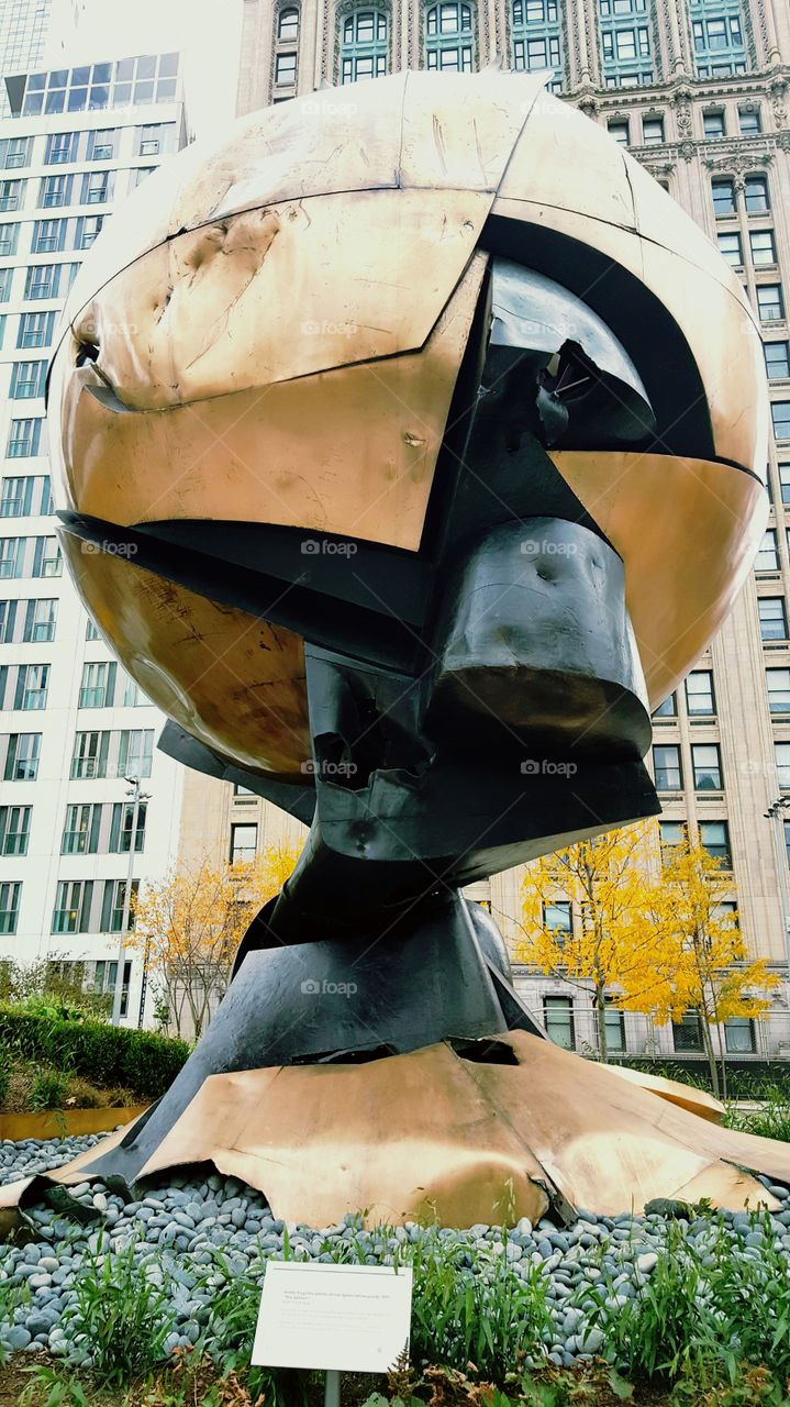 The Sphere.
It was originally located on the plaza of the world trade centre. Recovered from the rubble of WTC following the September 11, 2001 attack and preserved in memory of those who died on that day.