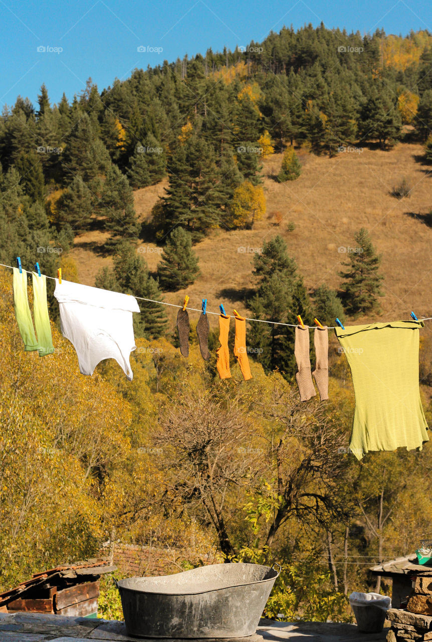 Clothes hanging on the rope outdoor, laundry time