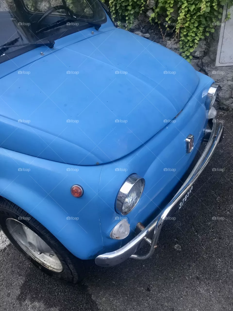 Front of a classic Fiat 500 in Amalfi, Italy.