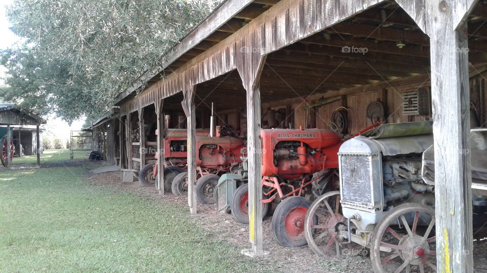 different eras of tractors on Plantation