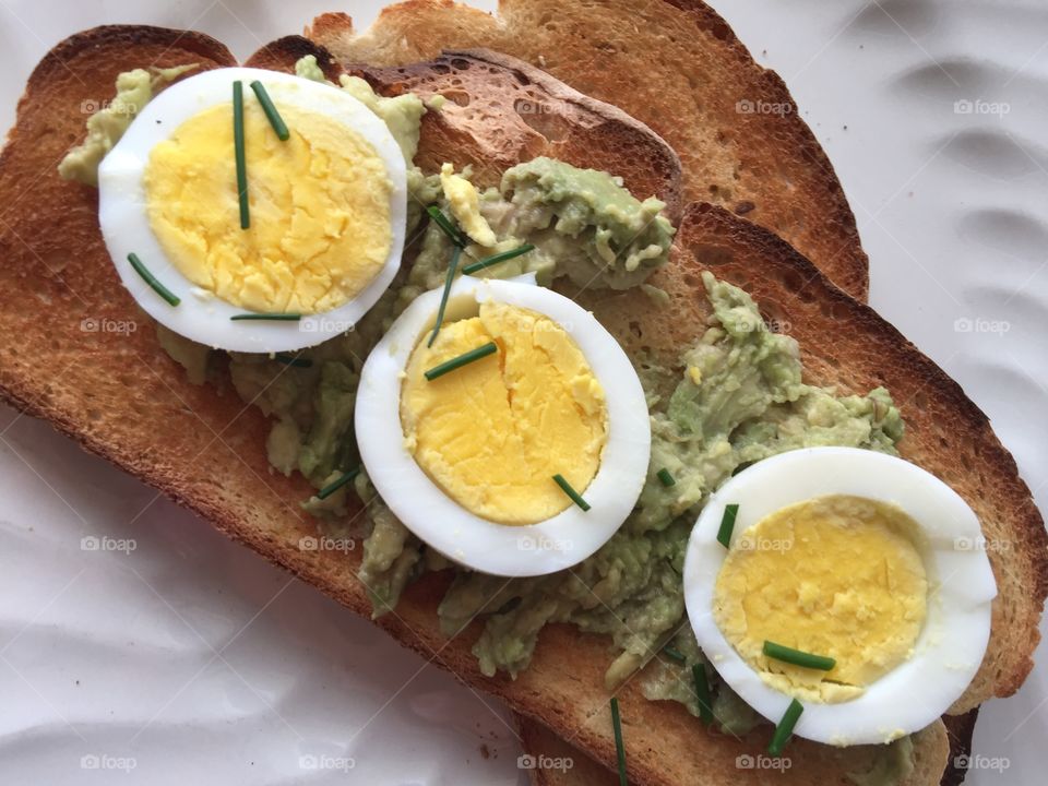 Avocado toast with sliced boiled egg