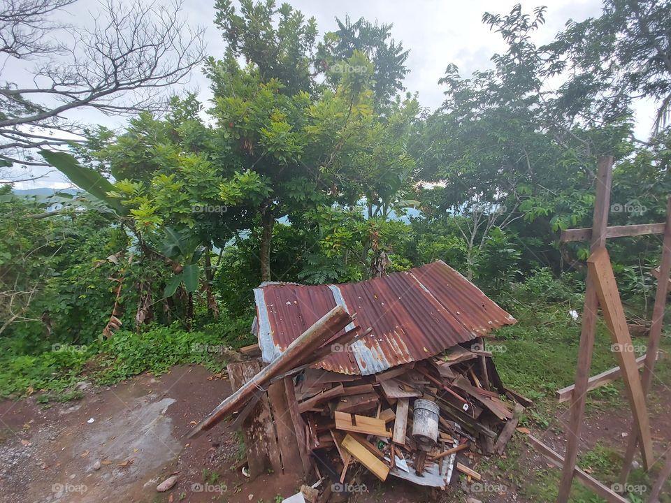 Dilapidated structure on a hillside