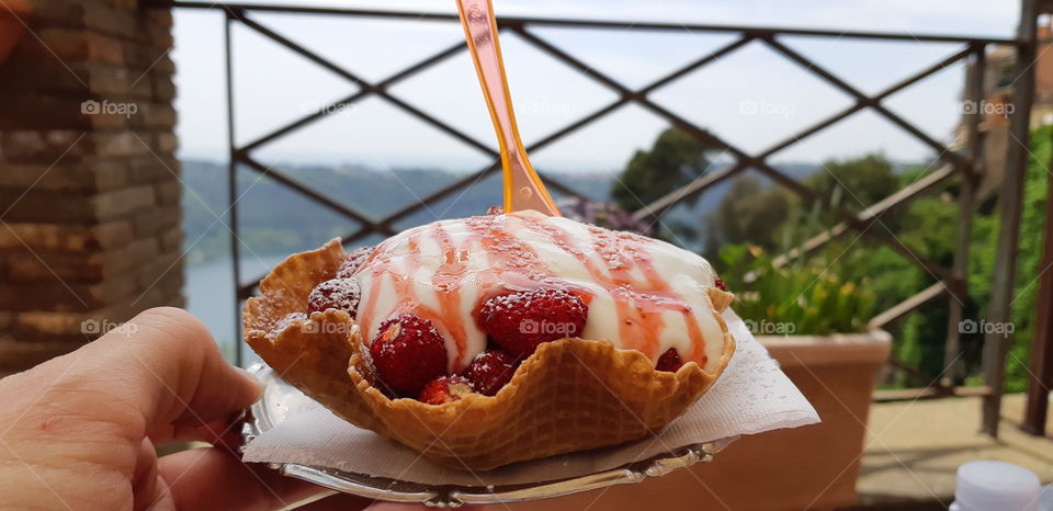 Small strawberres with fresh yogurt. Tipical dessert in Nemi Rome Italy