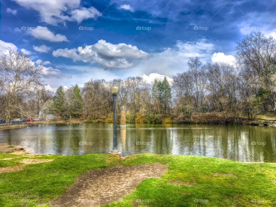 Lighthouse in a pond. 