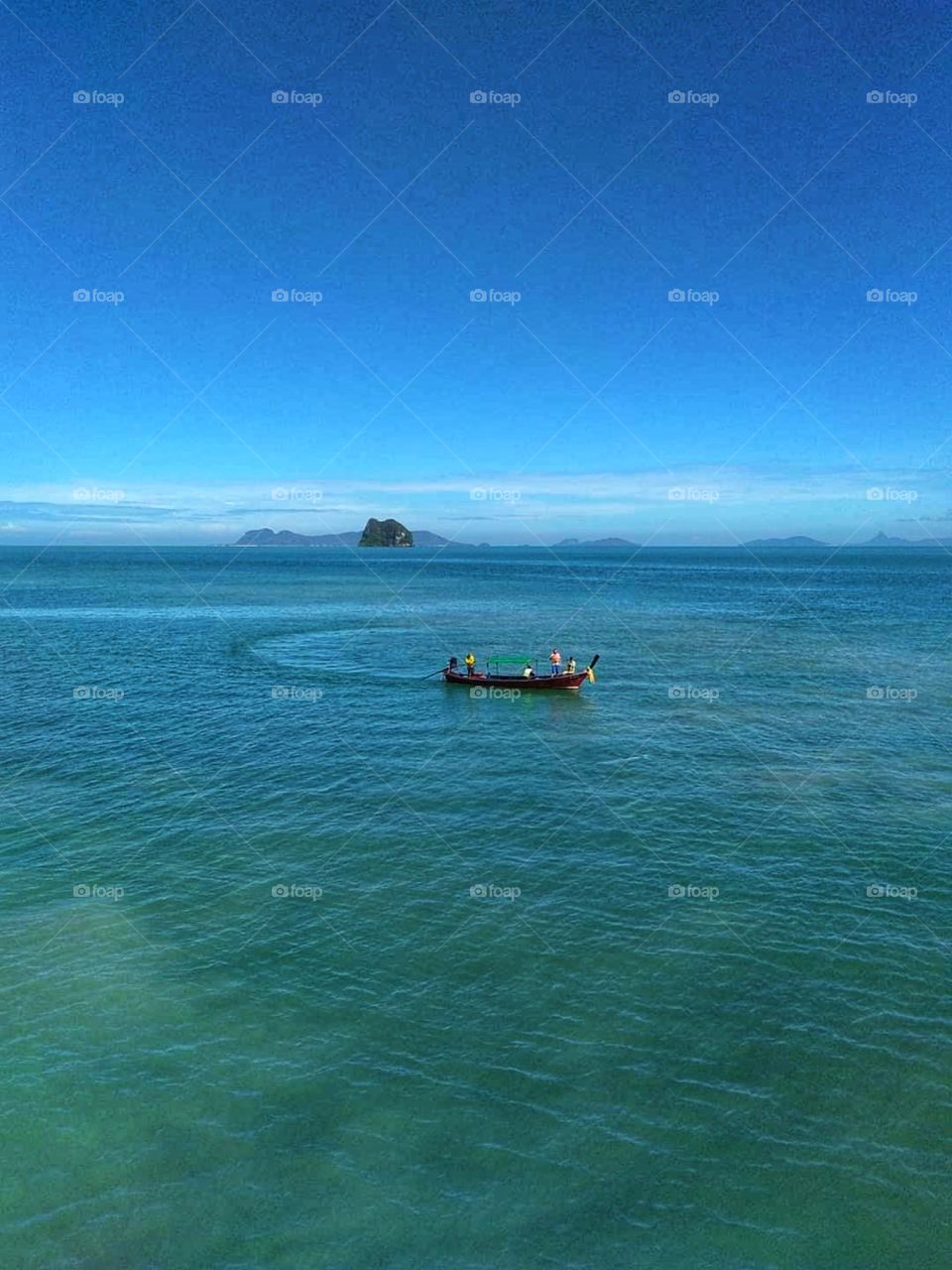 Blue green sea fishing boat