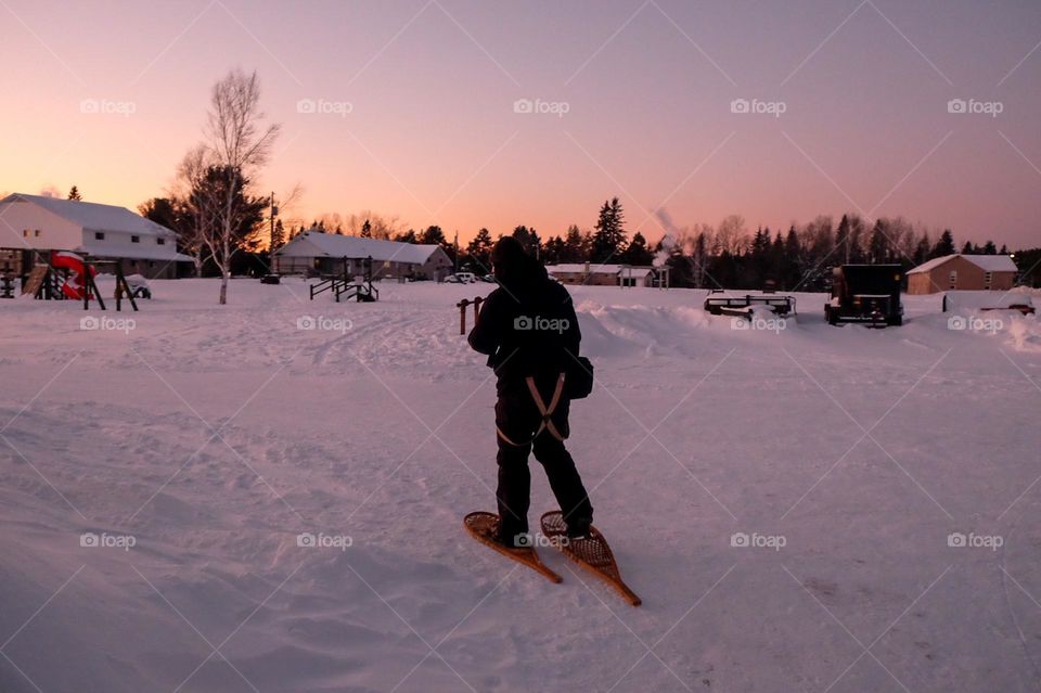 Northern Ontario Canada snowshoeing through frozen cold white snow