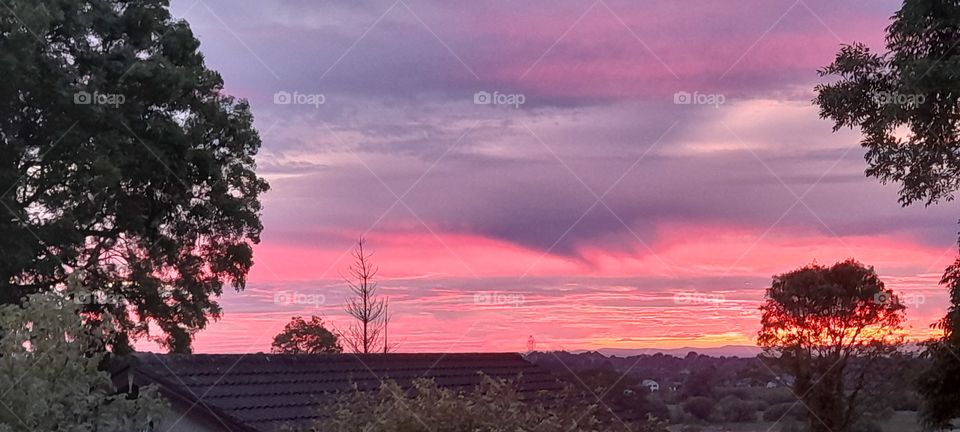 Sun set in Northern Ireland, summer, red sky with clouds