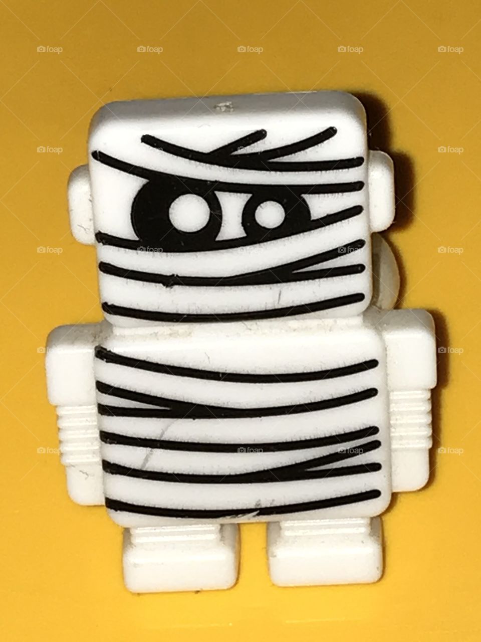 A mini Egyptian mummy. He is a funny, cute sight for sore eyes.