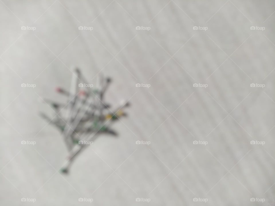 Defocused background abstract of some pins on the floor