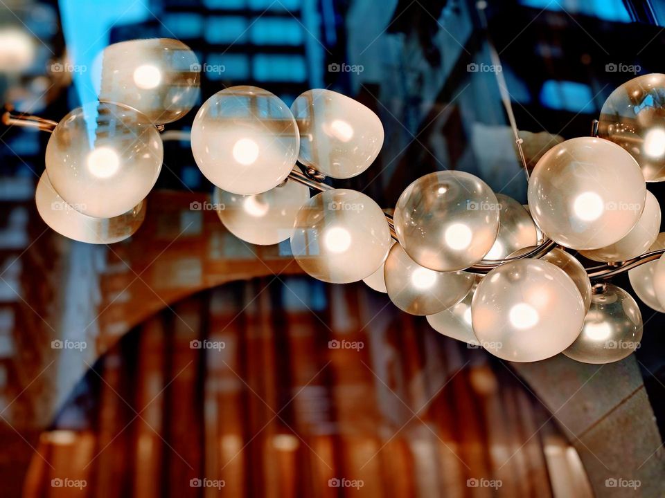 Lights in a shop with reflections