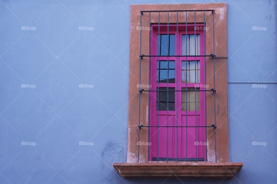 Old window on wall background