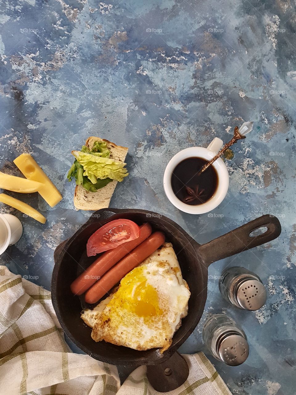 breakfast with egg, vegetables and sausage