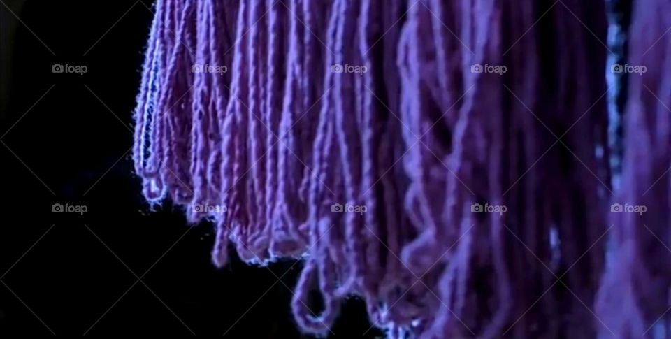 Violet wool string arranged in line