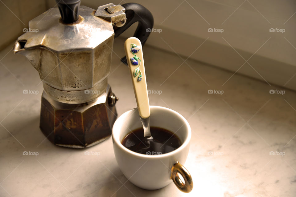 prepare an Italian coffee with old coffee house