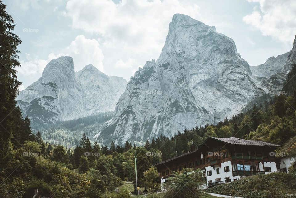 A remote village between the icy mountain range during winter