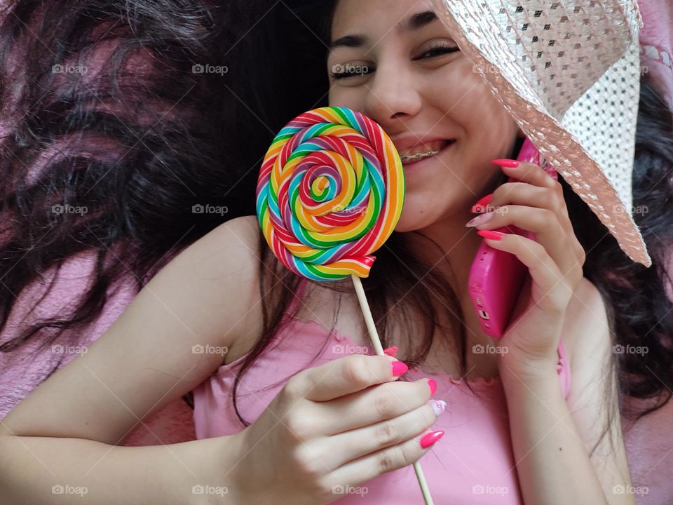 Vibrant Portrait of Girl with Big Lollipop