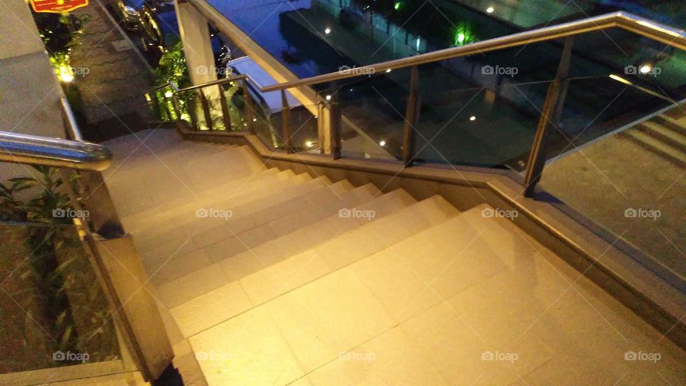 Stairs with evening lamps