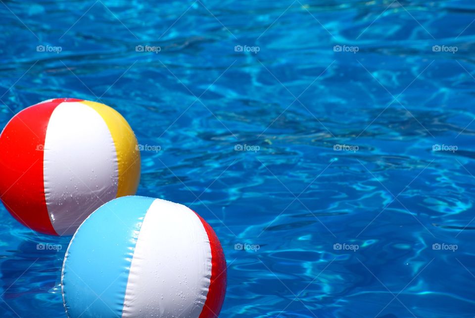 Beach balls in the pool 