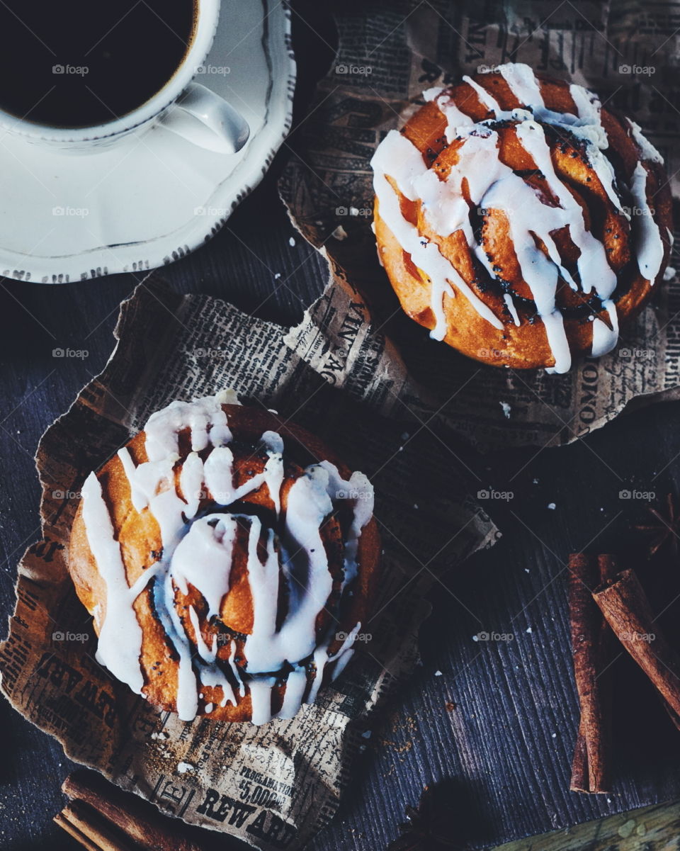 cinnamon rolls with cup of coffee