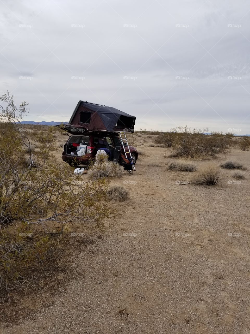 car with roof top tent