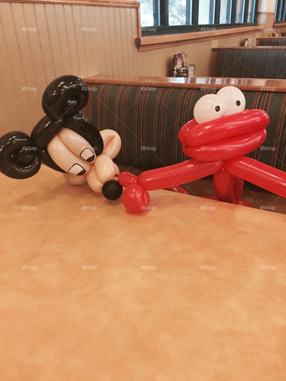 Mickey Mouse and Elmo on a Date. Mickey Mouse and Elmo on a Date