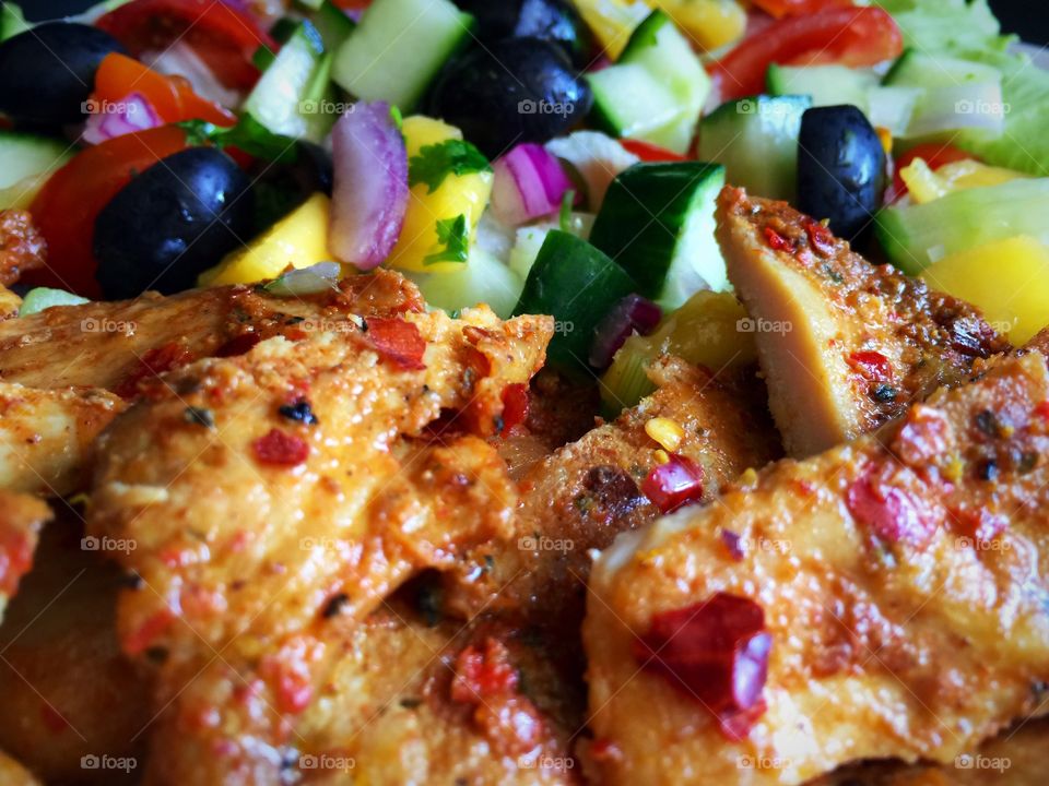 Homemade Grilled spice chicken with Mediterranean salad