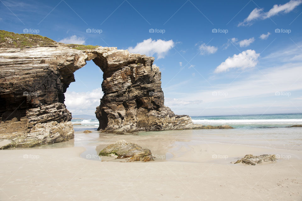 Cathedrales beach in Spain. On this beach, you can walk only a few hours a day because of the ocean tide. 