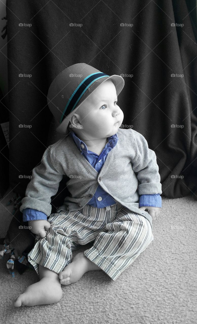 Little boy blue. my son's 8 month pictures.  he was mesmerized by the snow outside the window. 