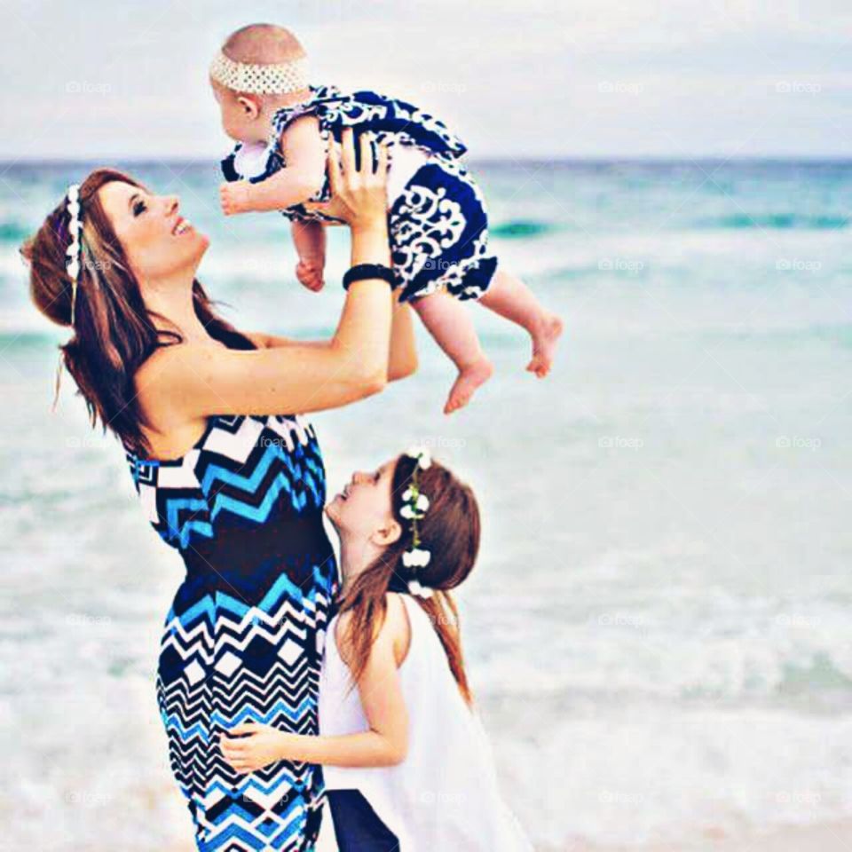 Mother & Daughters On The Beach