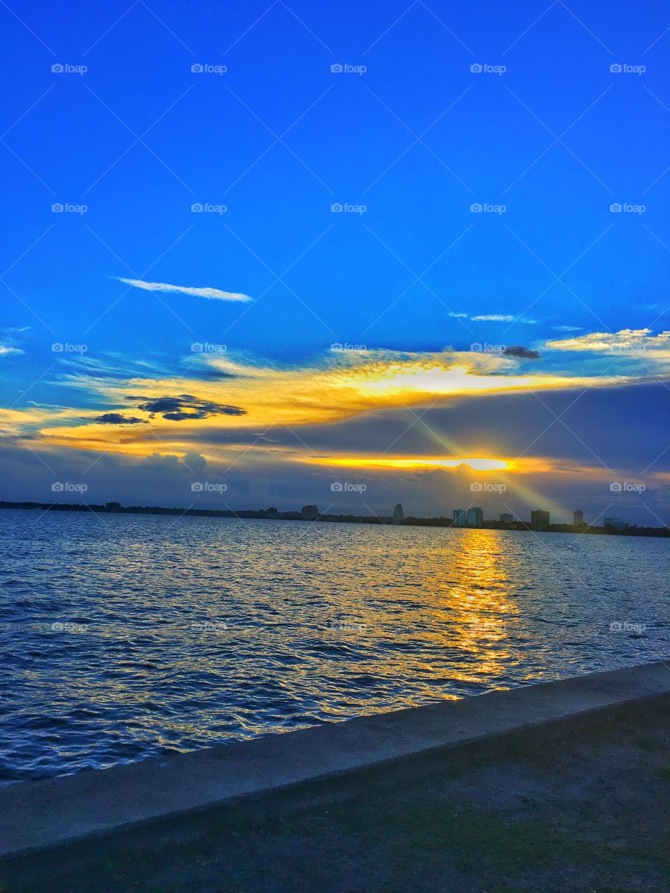 Urban sunset. River city