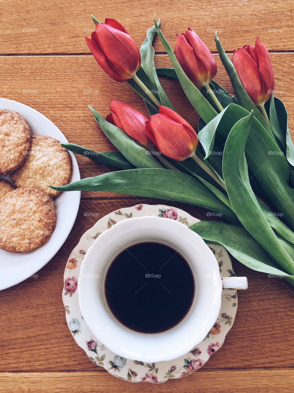 Hot black coffee with flowers