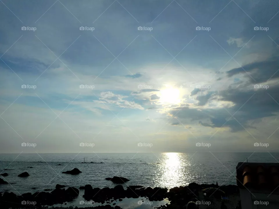 The magical sun reflection on the sea in San Francesco Bay on the Italian island of Ischia