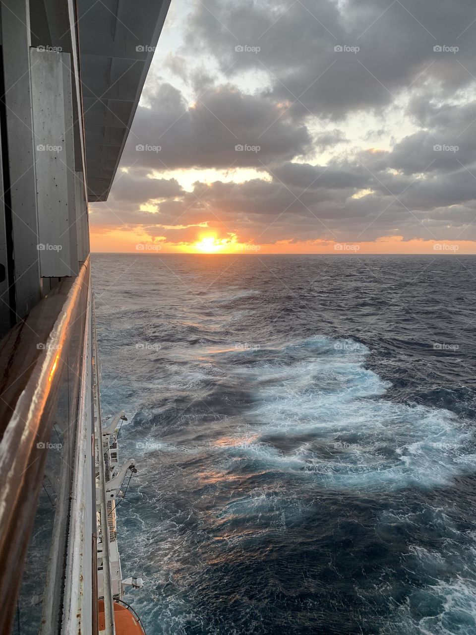 Sunset over the ocean in the Caribbean on cruise ship