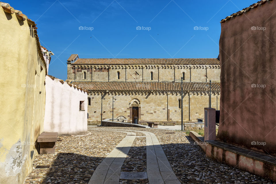 View of the church in the old streets of Tratalias, Sardinia