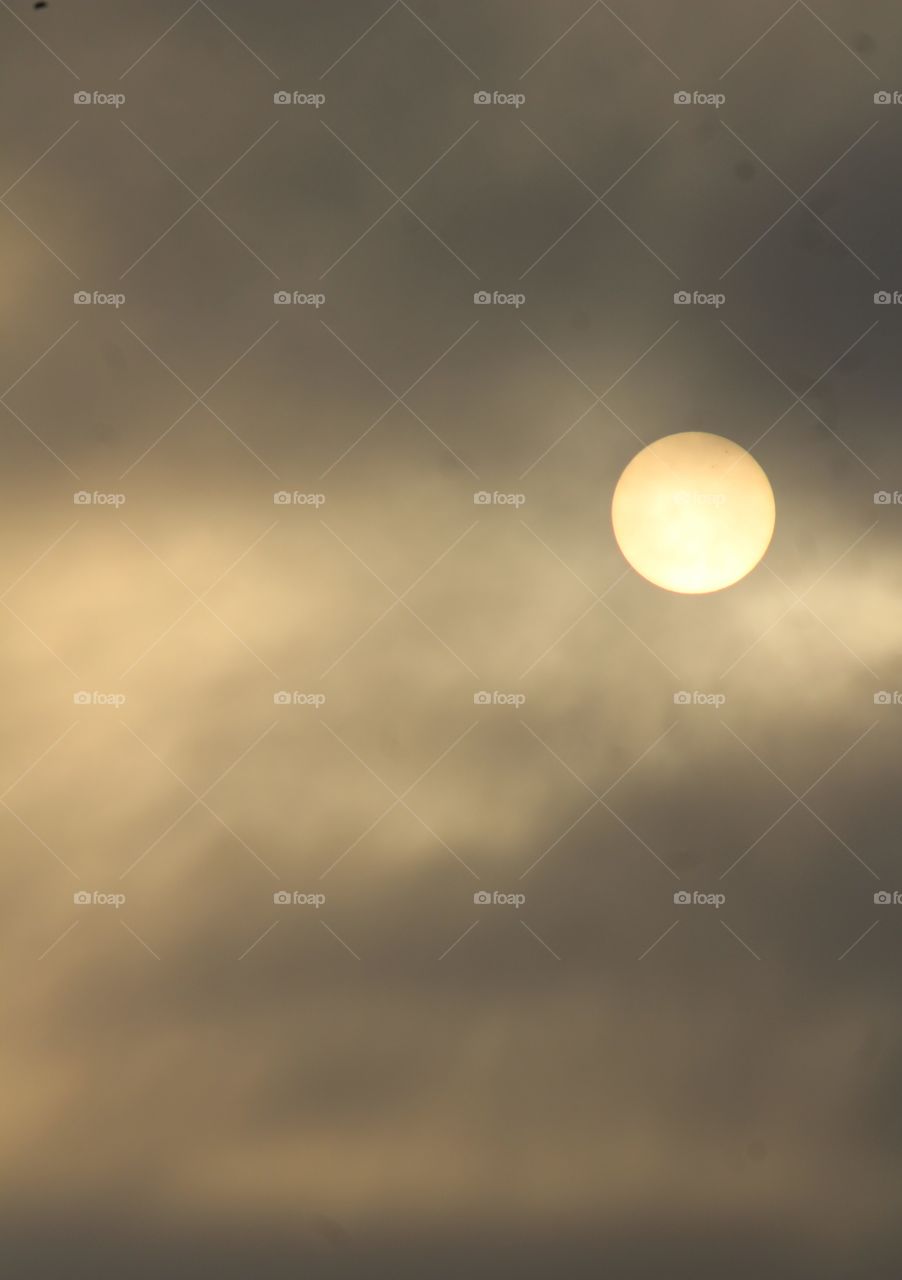 Early morning sun with wispy dark clouds, May 26, 2021 