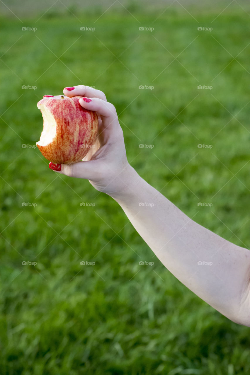 bitten . bite out of a apple